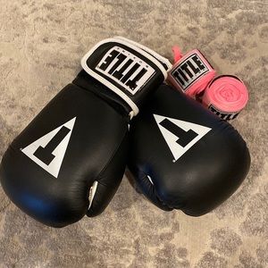 TITLE boxing gloves with hand wraps 🥊
